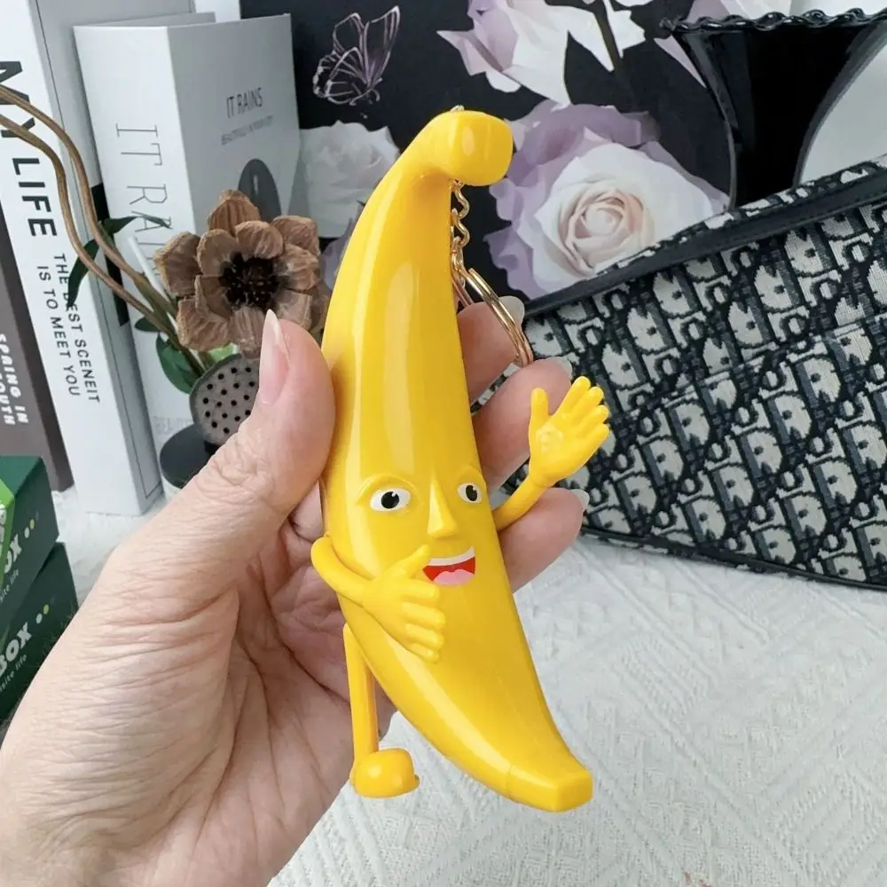 Novelty Funny Big Banana Keychain Creative Music Singing Banana Keyring Plastic Standing Movable Hand Banana Pendant Car