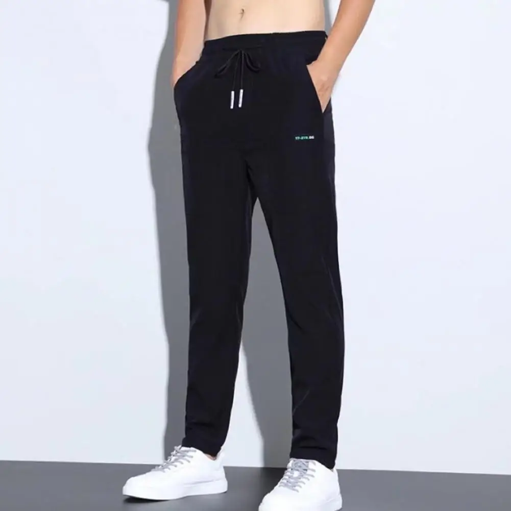 Homens sweatpants cordão multi bolsos verão cor sólida meados de cintura solta respirável perna reta calças masculinas streetwear