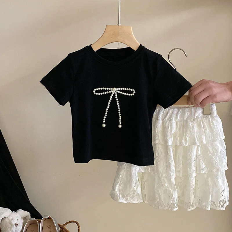 Girls 2024 Summer New Korean Bow T-shirt Short Sleeved Short Skirt Set Fashion Childrens Wear Baby Girl Outfit Set