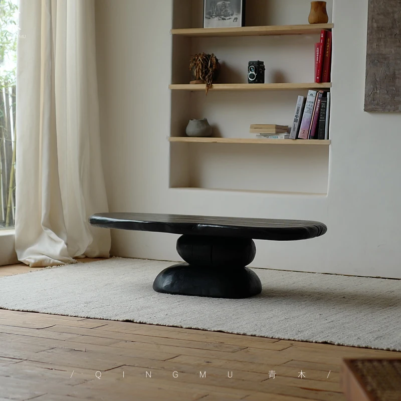 Wabi-sabi wind living room retro creative special-shaped carbonized black pebble solid wood tea table