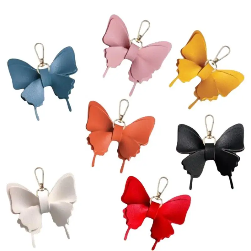 Schmetterlings-Schlüsselanhänger aus PU-Leder mit leuchtenden Farben und robustem Metallverschluss, perfekt zum Dekorieren von Rucksäcken und Handtaschen. – Detail 5