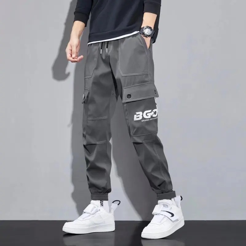 

Новые осенние мужские повседневные рабочие брюки свободного кроя в американском уличном стиле, с зауженными штанинами и эластичными манжетами, для отдыха