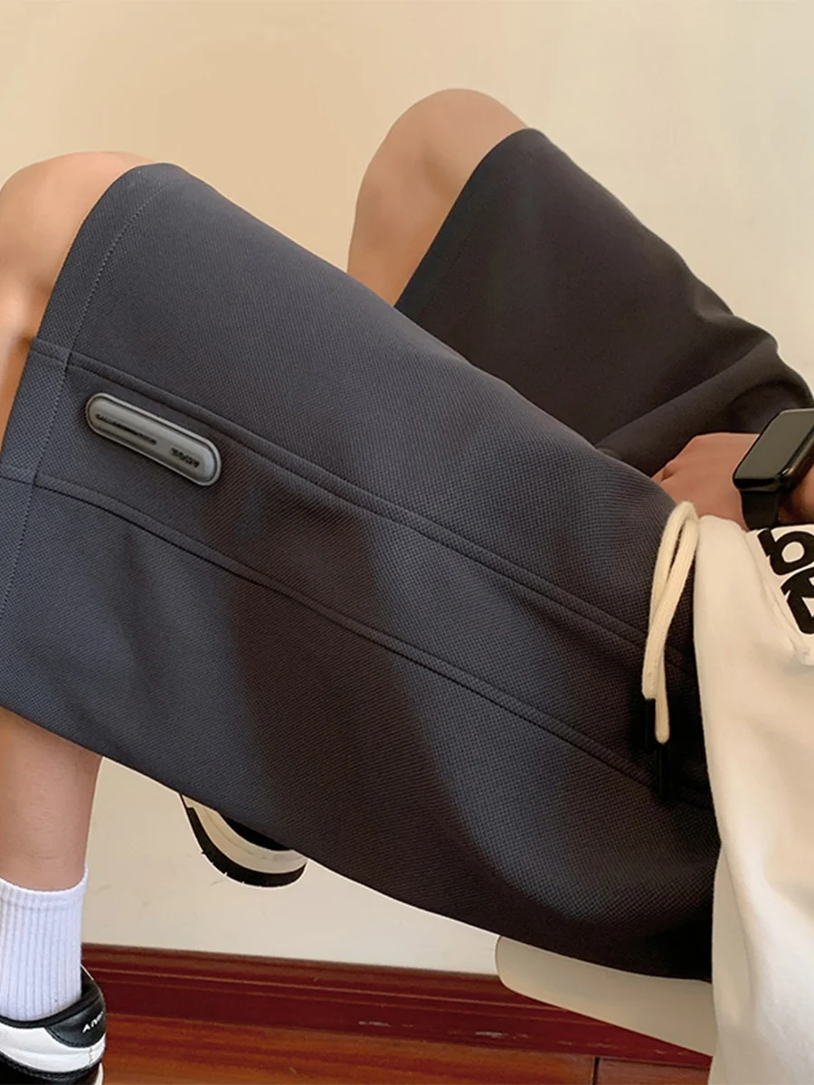 

Модные вязаные шорты 2025 года для мужчин: летние, больших размеров, свободные, повседневные, спортивные, в американском уличном стиле, длиной до колена