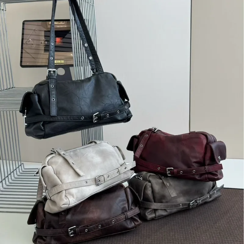 

High Quality Leather Shoulder Bag Niche Pocket Locomotive Bag 2025 New Women Rivet Belt Design Bowling Shoulder Armpit Bag