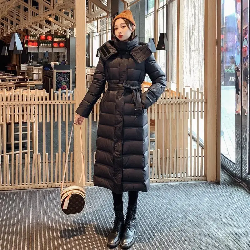 2025 New Black Winter down Jacket For women Medium long Korean version Slim Waist cinching Slimming Over knees Hooded Warm Coats