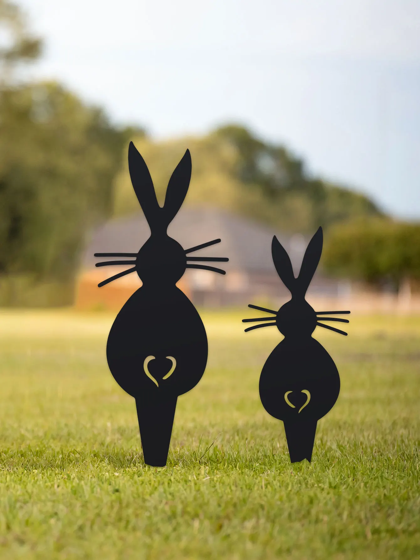 2D Flat these black rabbit ornaments with heart-shaped details add a playful to any garden.Black metal rabbit garden decorations