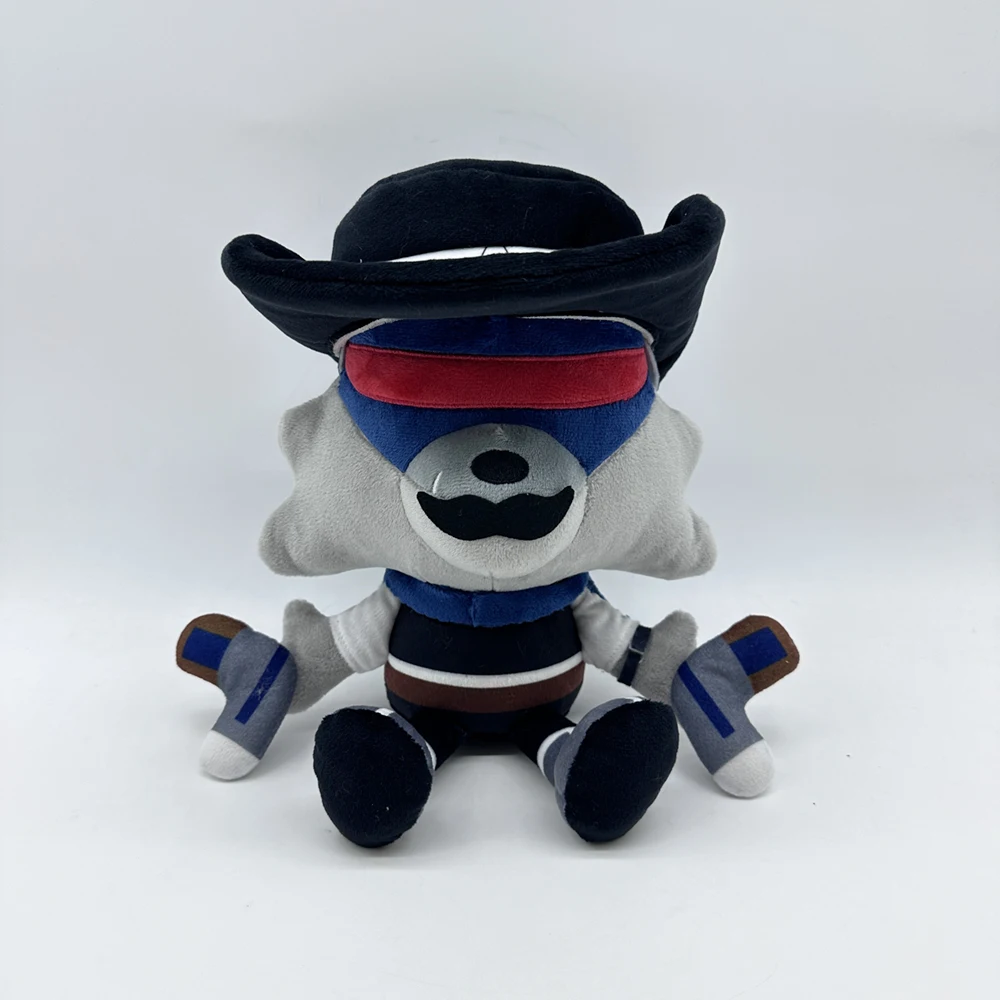 A wolf plush toy wearing a blue and red eye mask and a black hat is creatively designed to be cute and playful