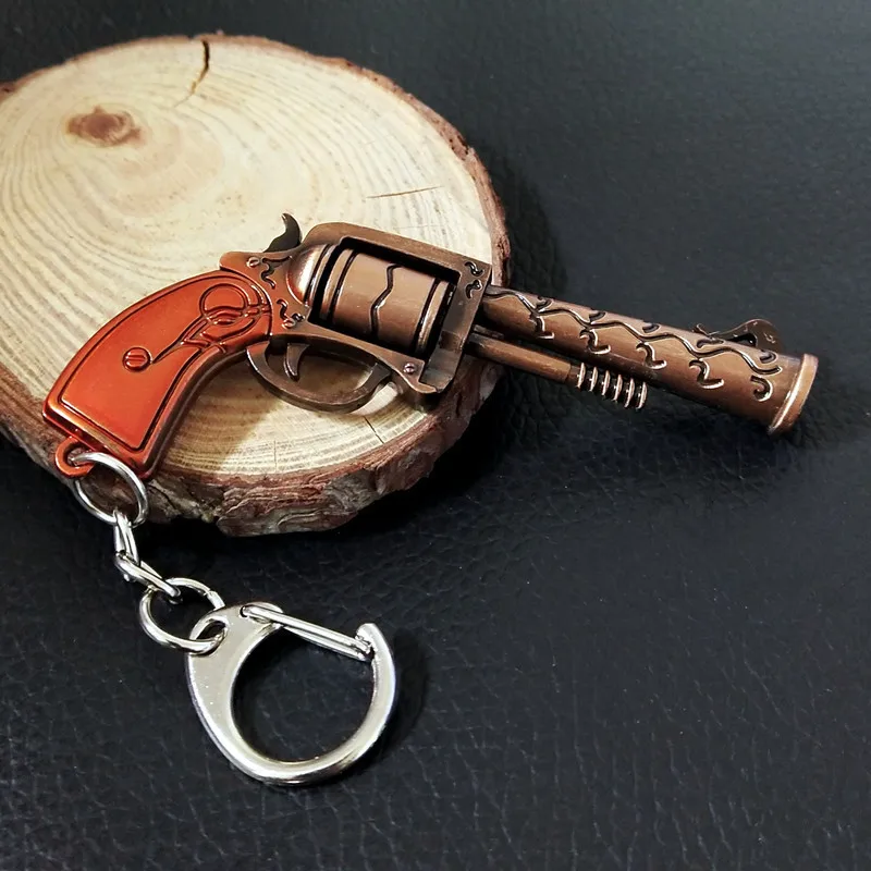 7.5cm/2.95in Peace Game Peripherals Bastion Mini Pistol Keychain Weapon Models Creative Backpack Pendant Boys Toys Gifts Crafts