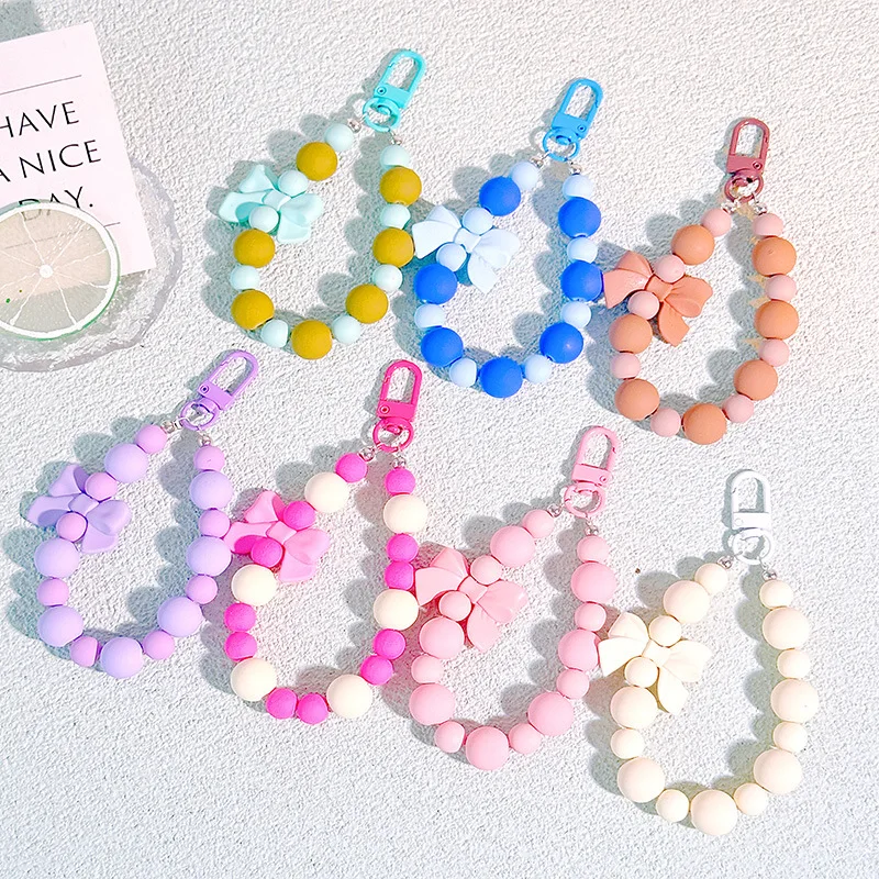 

Брелок с жемчужным бантом, сумка для наушников, веревка с защитой от потери, автомобильный брелок, подвеска из бисера, подвеска на рюкзак, дорожные аксессуары