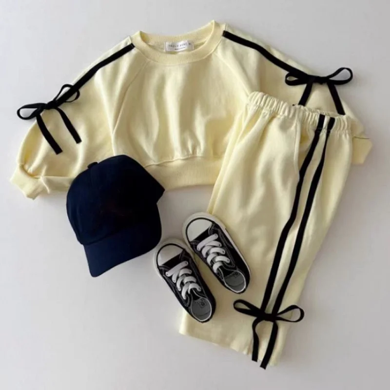 New Spring tinta unita Top a maniche lunghe Set per bambini Bow Bar impiombato maglione da ragazza Pullover pantaloni lunghi sport Set a due pezzi