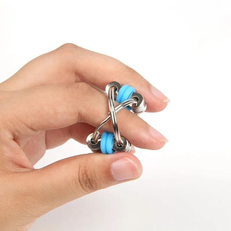 Mini llaveros coloridos para niños y adultos, juguetes sensoriales de descompresión con cadena de Metal para aliviar el estrés, Spinner para la yema