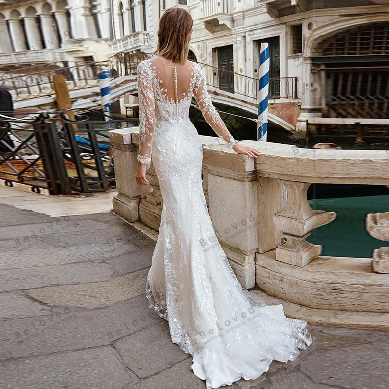 Splendidi abiti da sposa Sweetheart Abiti da sposa Applicazioni in pizzo Maniche lunghe Guaina Sirena Backless 2023 Abiti da sposa 2024