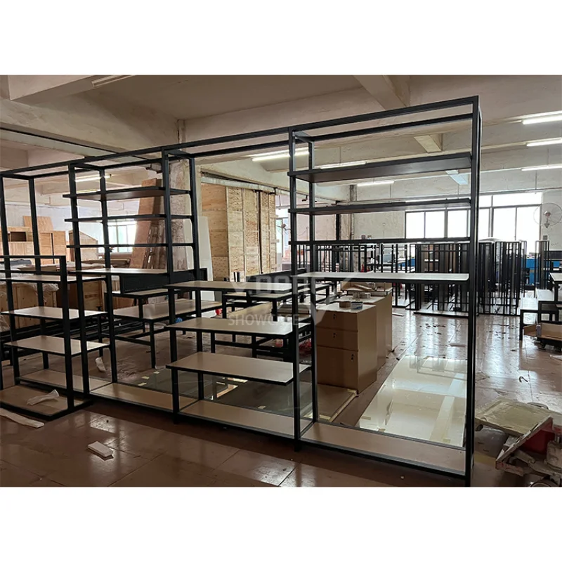 

Customize.High Quality Modern Hanging Garment Display Rack Golden Clothing Display Stand Shop With Shelf