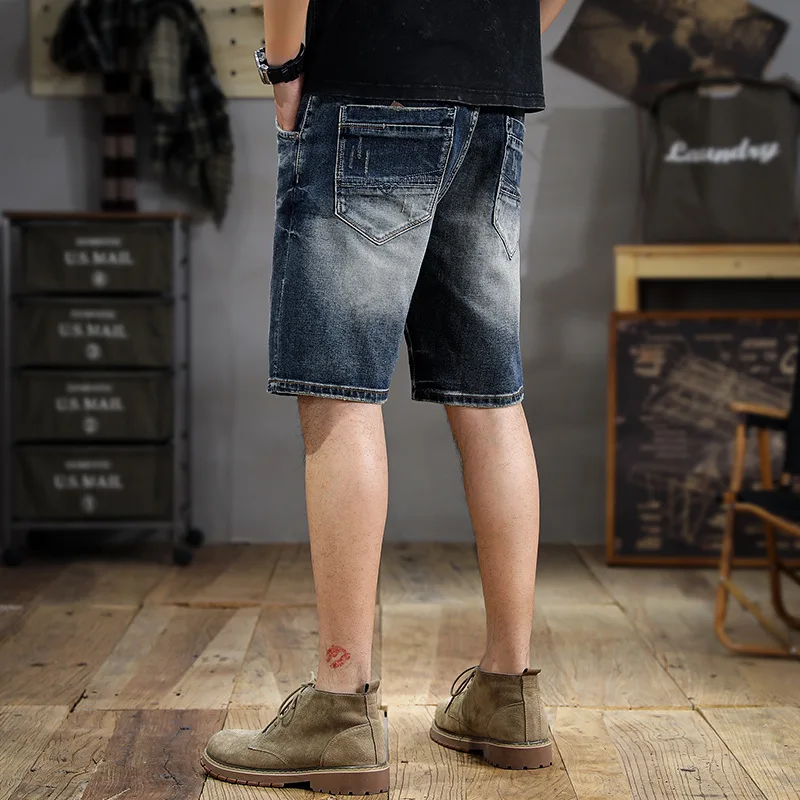 Pantalones cortos de mezclilla rasgados lavados Retro para hombre, pantalones cortos rectos delgados, pantalones de media pierna, volantes de calle, marca de moda de verano