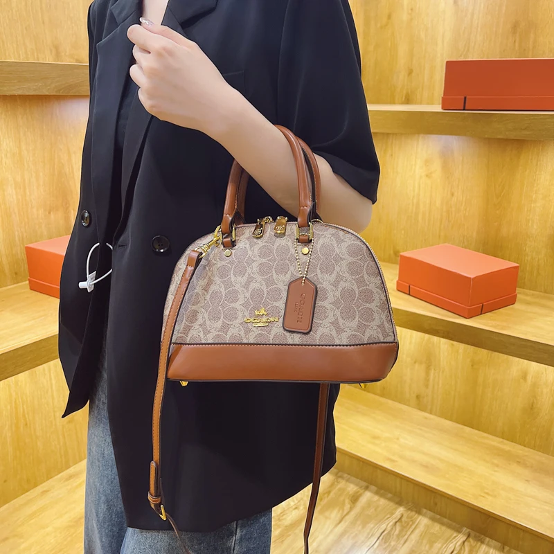 

Изысканная женская сумка через плечо из роскошной кожи, элегантный изогнутый силуэт для современных женщин