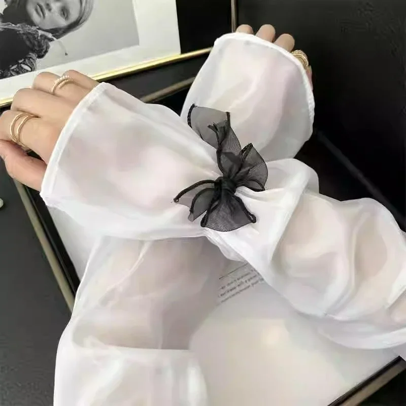 Les manches de protection solaire sont douces et mignonnes avec un nœud papillon unique offrent un look délicat, doux et haut de gamme.