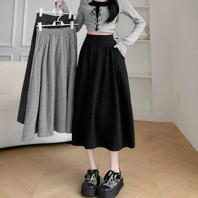 Cor sólida casual com bolsos a linha saias femininas coreano emagrecimento elástico de cintura alta saia longa mulher versátil midi saias