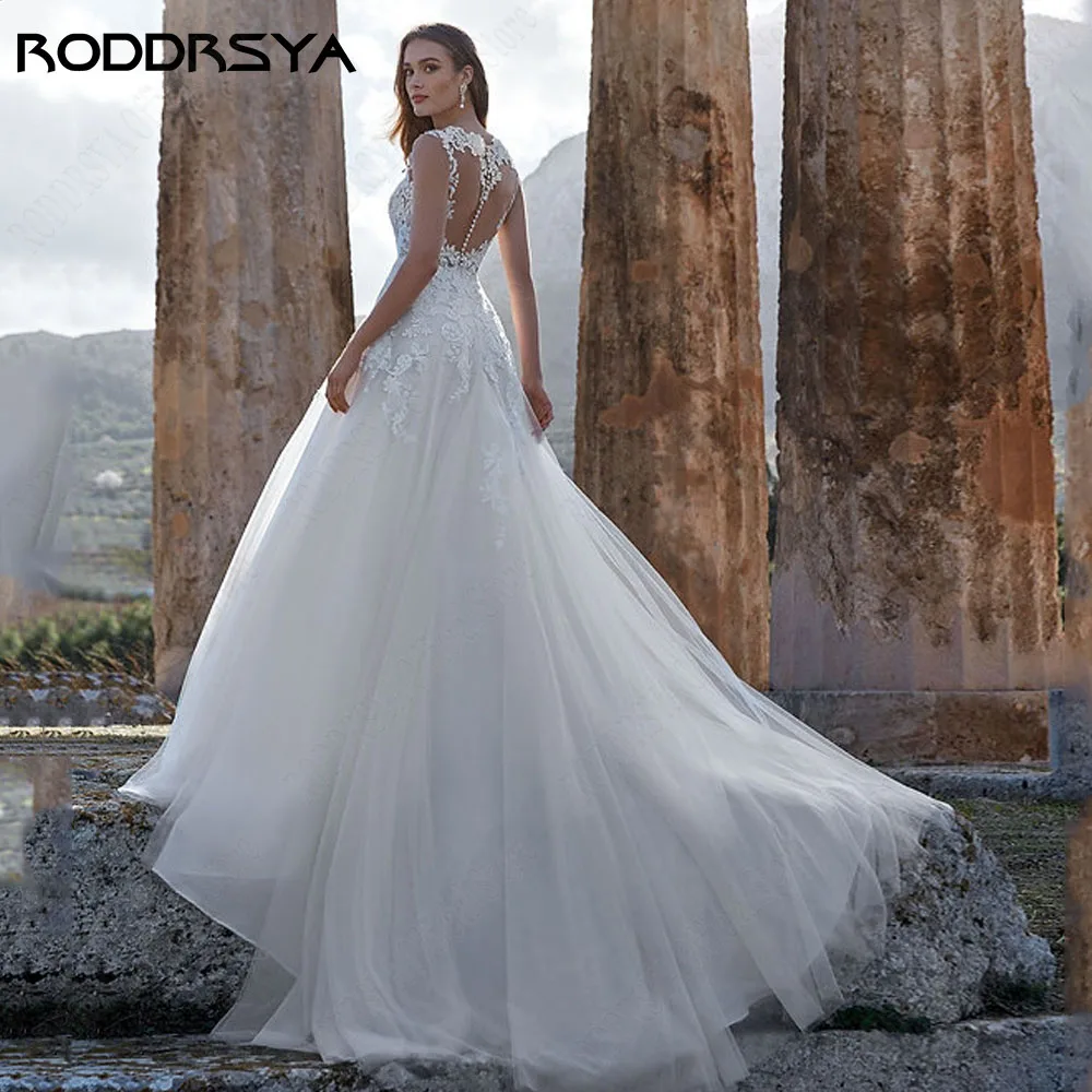 Roddrsya ชุดแต่งงานลูกไม้แขนกุดชายหาด appliques ชุด backless ทำ A-Line Tulle กระดุม