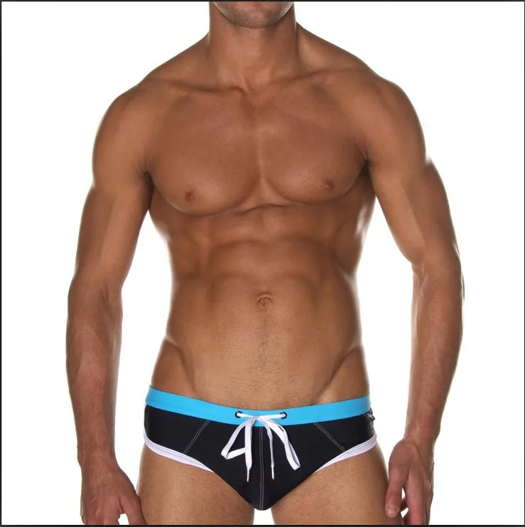 regular large bag triangle swimming trunks with low waist and breathable silky smooth color matching elastic beach  trunks