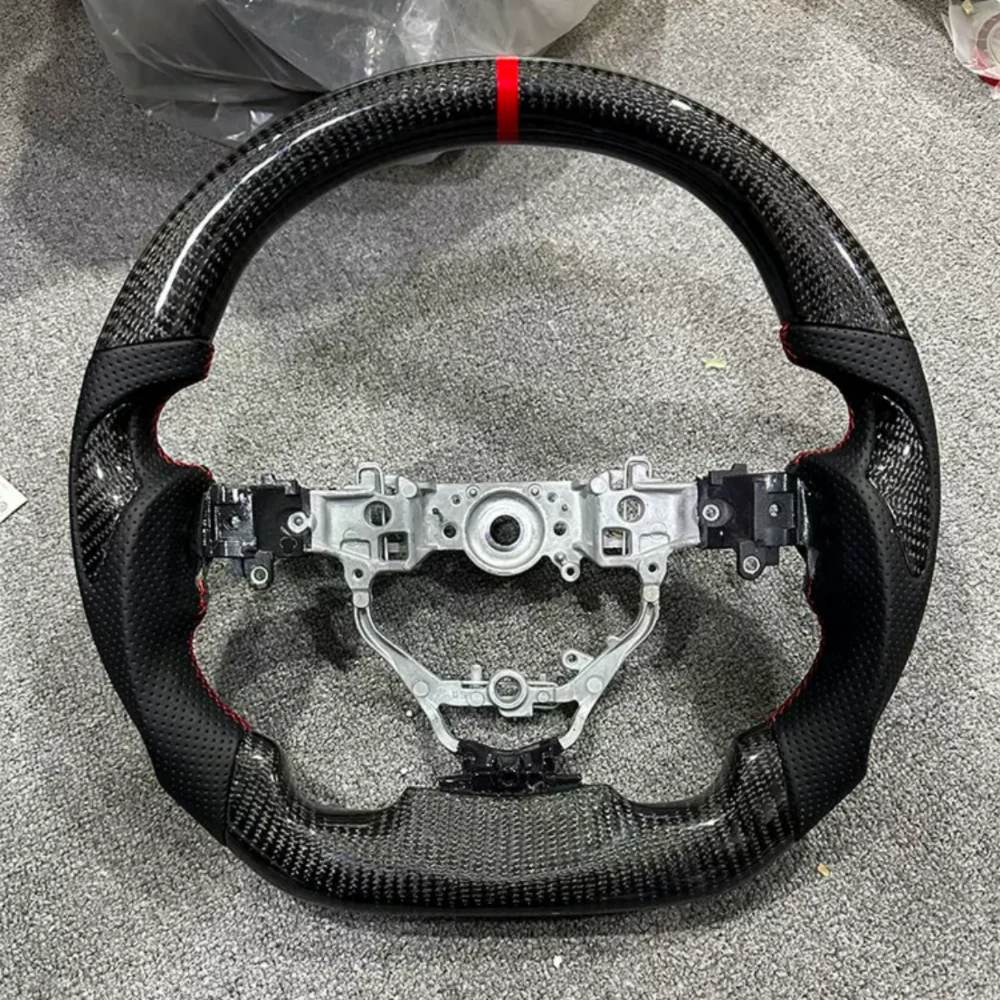 Suitable for Toyota YARiS imported version of YARis Vios true carbon fiber steering wheel sports version