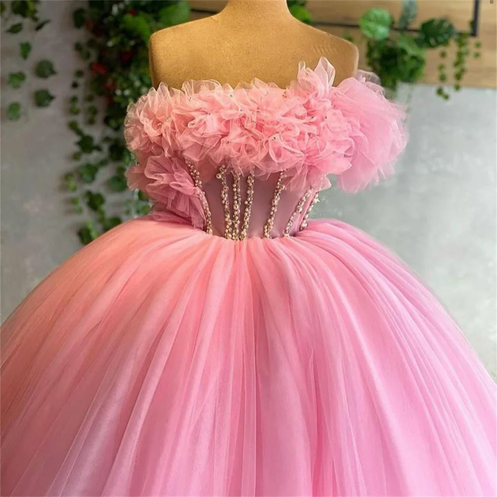 Sansa Luxury فساتين سهره فاخره Strapless 2023 Baby Pink Ball Gown فساتين للحفلات الراقصة Sexy Sequins On Chest Puffy Prom Dress