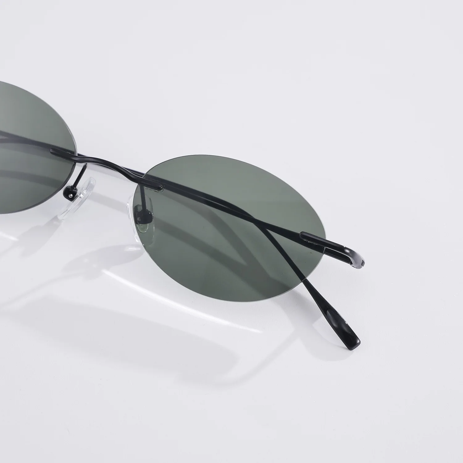 Modische Rahmenlose Polarisierte Sonnenbrille für Damen Reise-Fotografie-Sonnenbrille Reintitan-Rahmen Herren Punk Sonnenbrillen UV400-Schutz – Detail 4