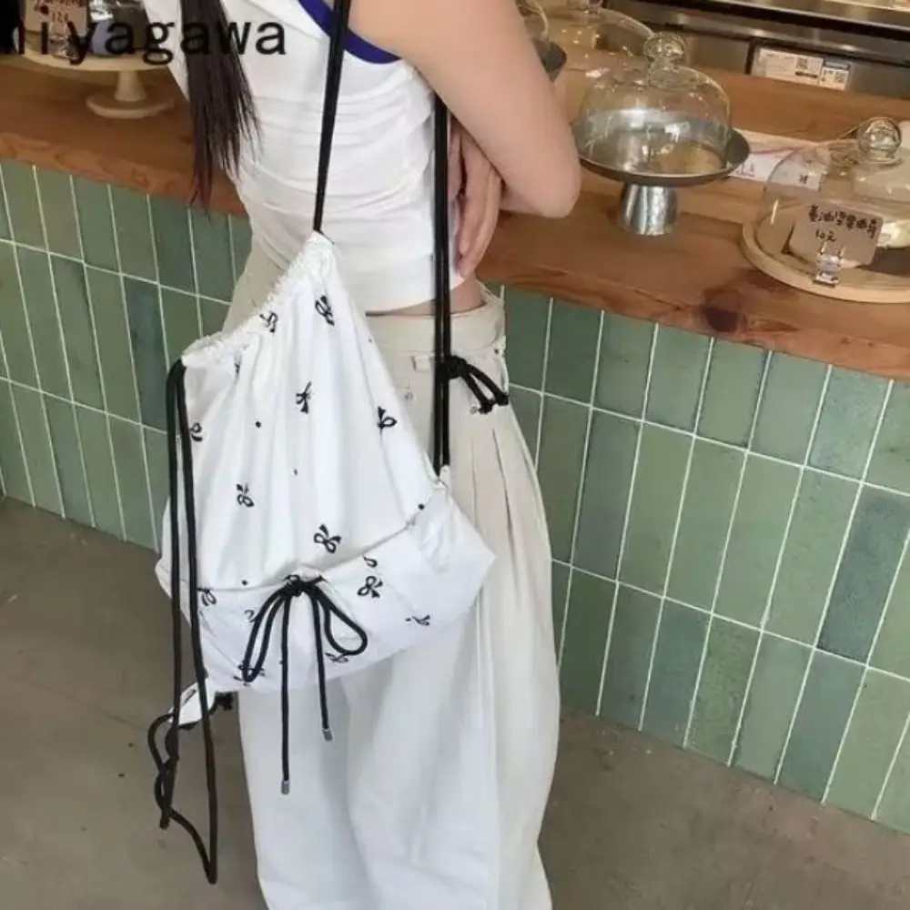 

Korean Style Bow Drawstring Backpack Large Capacity Sweet Light Weight Shoulders Bag Outdoor Travel Student School Bag Lady