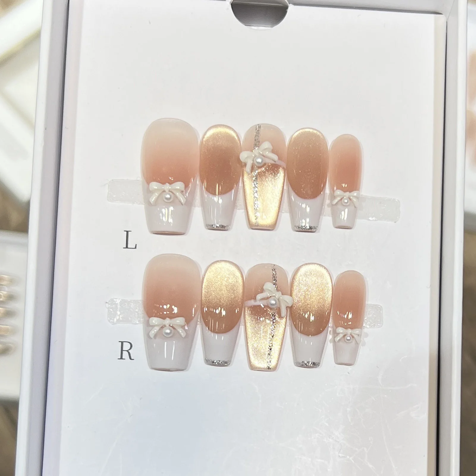 เล็บปลอมสำเร็จรูปสีชมพู 10 ชิ้น ลายตาแมว เรซิ่น ทำมือ สไตล์ฝรั่งเศส ประดับโบว์ สำหรับตกแต่งเล็บด้วยตัวเอง งานแต่งงาน งานปาร์ตี้