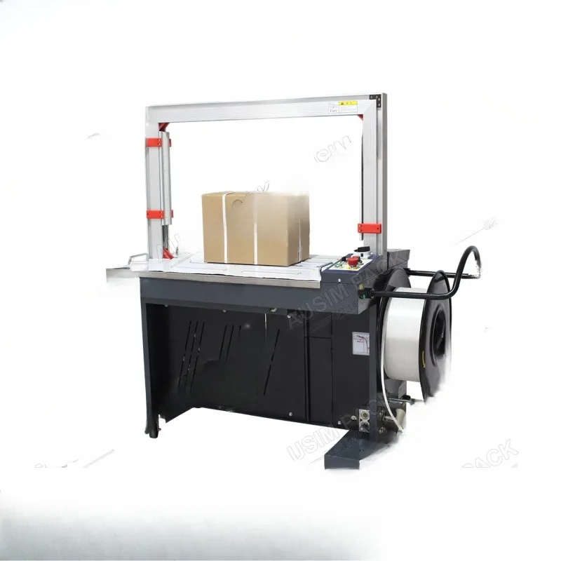 

Automatic high platform strapping machine PP belt cardboard box strapping machine food packaging plastic material