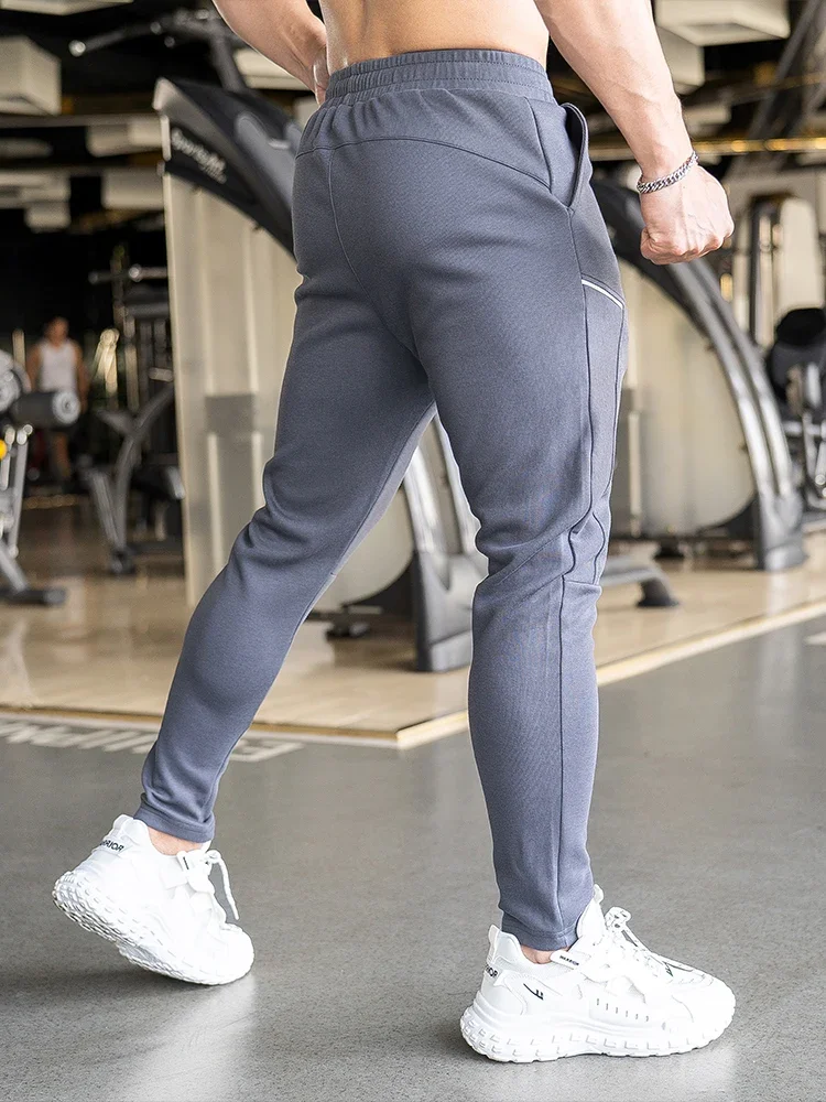 Higher Quality Man Training Wear Long Pants Men's Sports Fitness Casual Slim Stretch Running Sweatpants Winner Trousers Outdoor