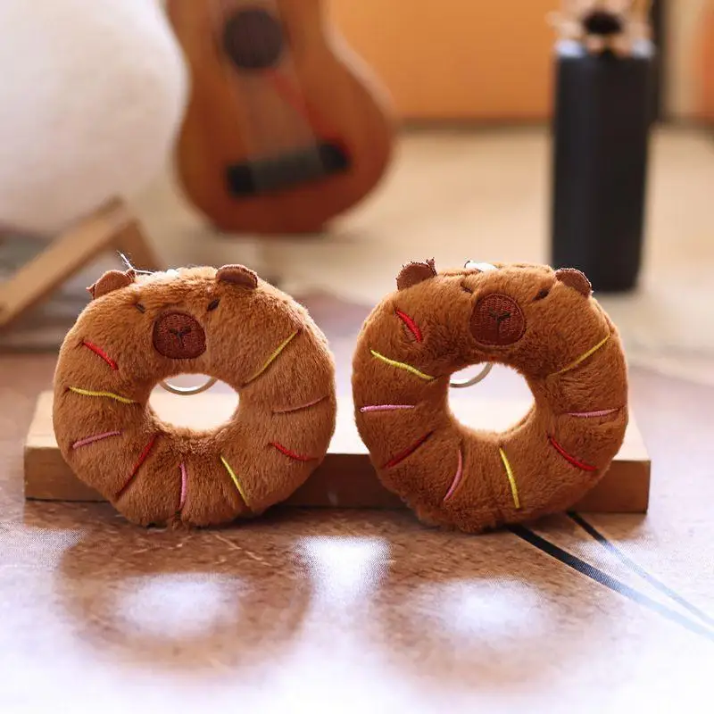 1 ชิ้น Creative Donut ตกแต่งอาหารตุ๊กตาพวงกุญแจการ์ตูน Capybara จี้ Soft Plush ตุ๊กตากระเป๋าอุปกรณ์เสริม