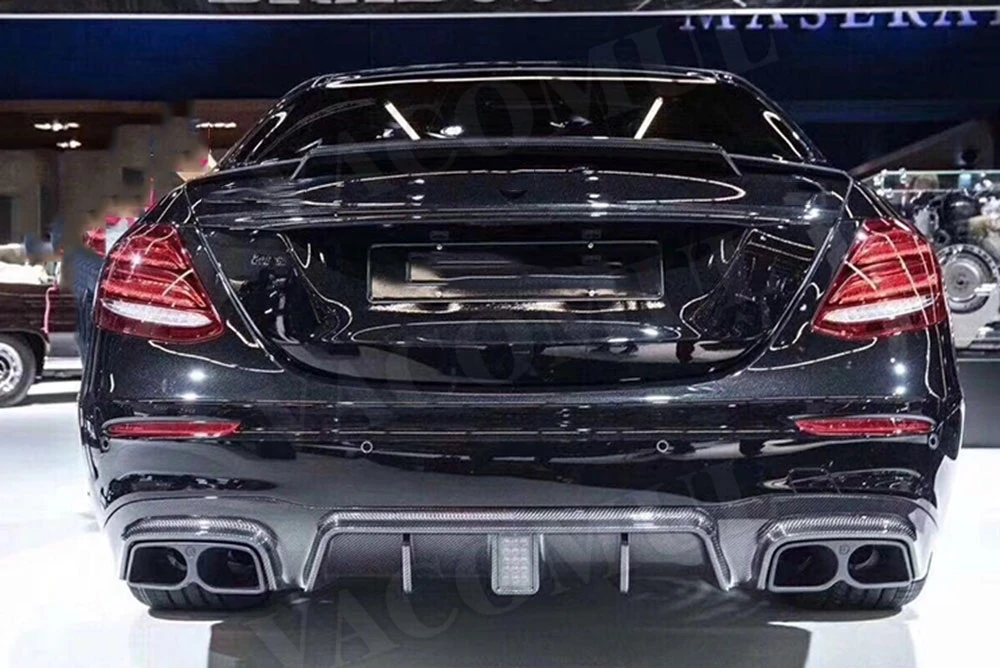 

For Benz E Class W213 E200 E260 E300 E63 AMG 2017 2018 2019 Body Kits Carbon Fiber Rear Bumper Lip Diffuser With Light