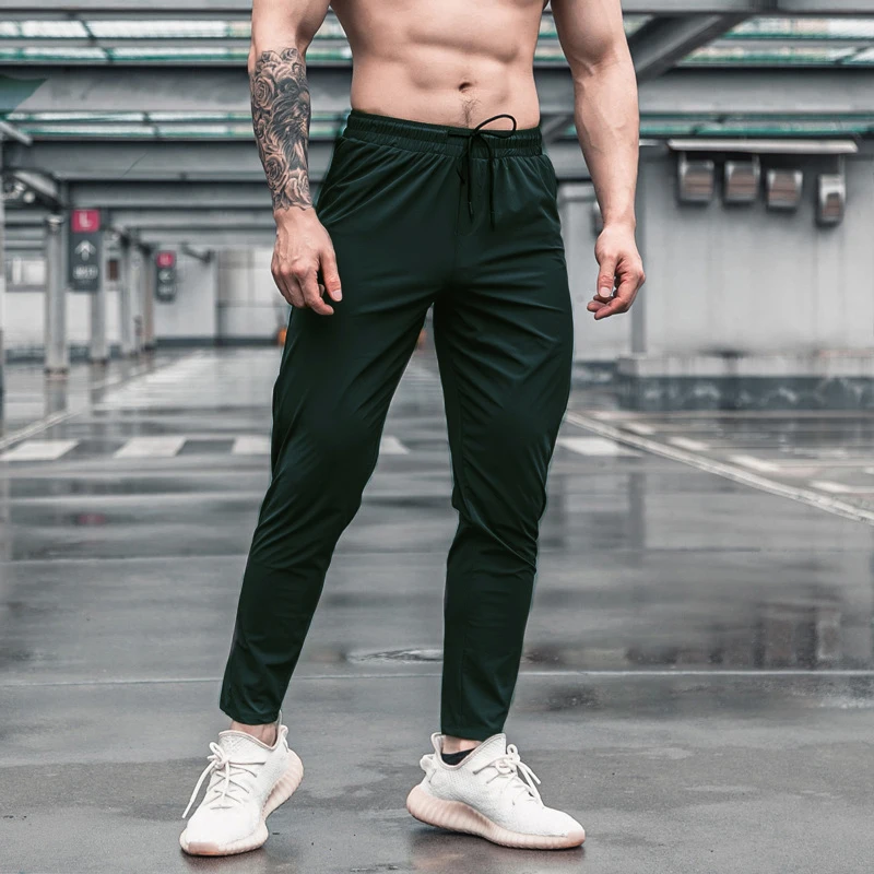 Mannen Sport Broek Met Zakken Running Workout Broek Quick Dry Training Jogger Joggingbroek Hoge Kwaliteit Fitness Bodems