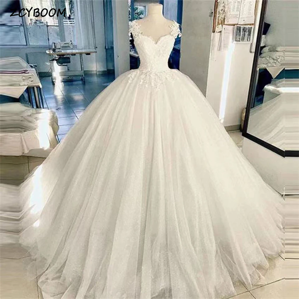 Elegante branco cinta de espaguete apliques sem mangas vestido de casamento 2024 vestido de baile até o chão trem varredura rendas até vestido de noiva