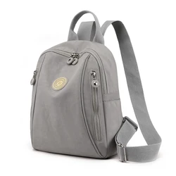 Zaino per studenti leggero zaino per donna di moda zaino in Nylon impermeabile con manico morbido solido Multi-tasca da viaggio con cerniera Feminina School Bags