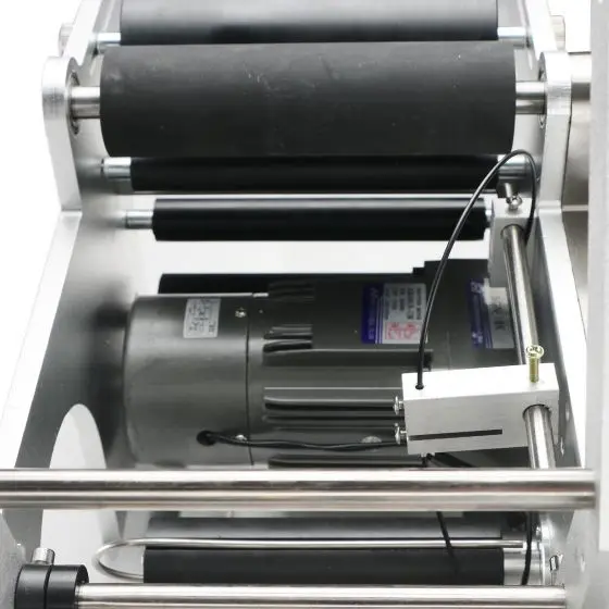 

Compact Auto-Sensing Labeler for Small Batch Craft Bottles