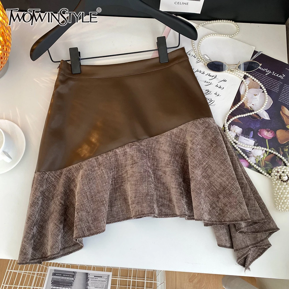 TWOTWINSTYLE New Patchwork Leather Chic Skirts For Women High Waist Spliced Zipper Asymmetrical Skirts Female Fashion KSK522365