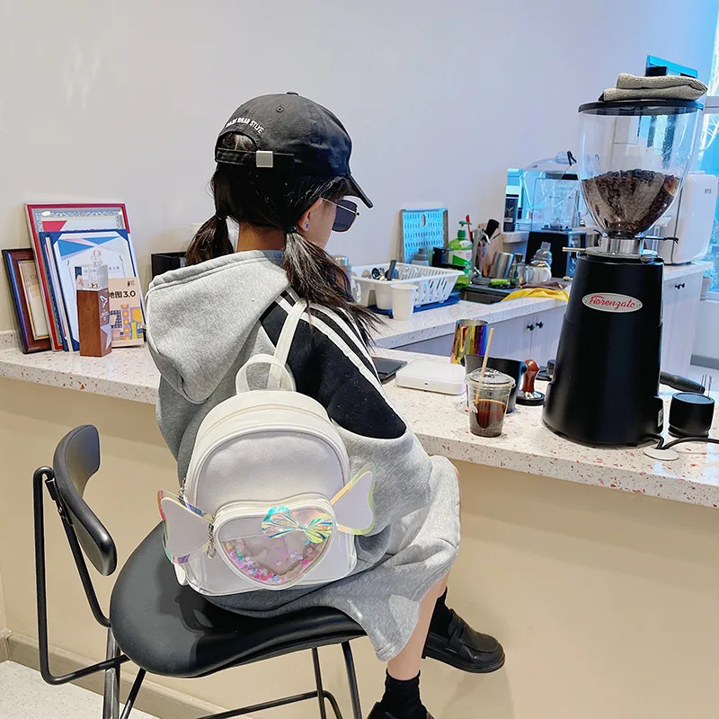 Mochila escolar de dibujos animados para niños, bolso de ala de amor, ligero, para madre y Niña