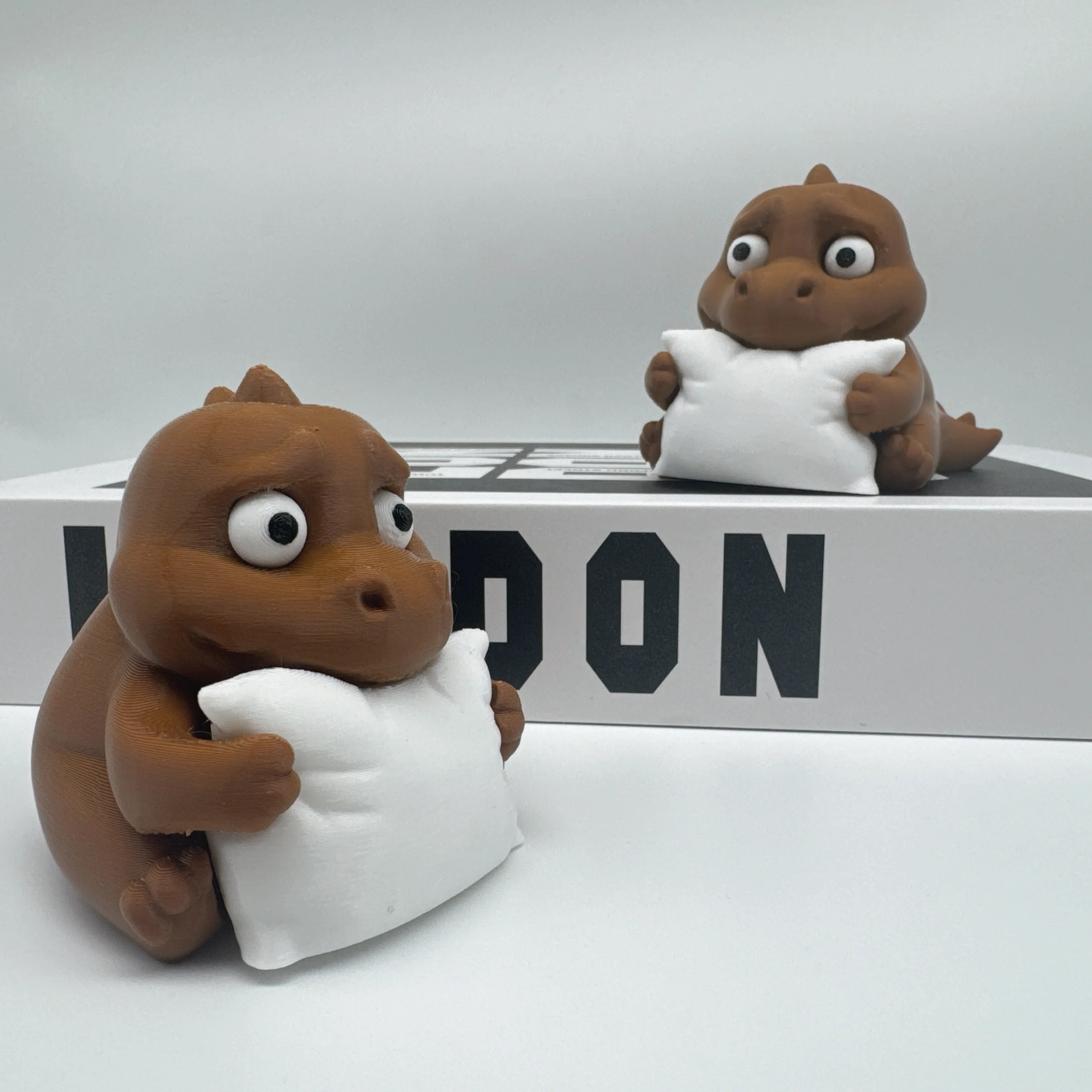 

3D Printed, Sleepy Dinosaur Statue Hugging A Pillow, Durable Plastic, Living Room Desktop Office Home Decor, Animal Lover Gift