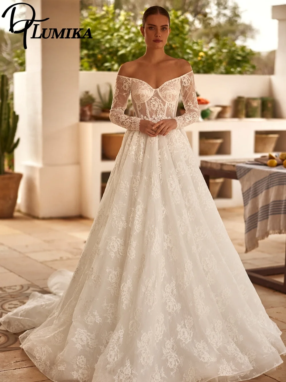 魅力的なオフショルダーのウェディングドレス 2026 エレガントな A ラインのブライダルドレス セクシーなレースのアップリケ フロアレングス カスタマイズ