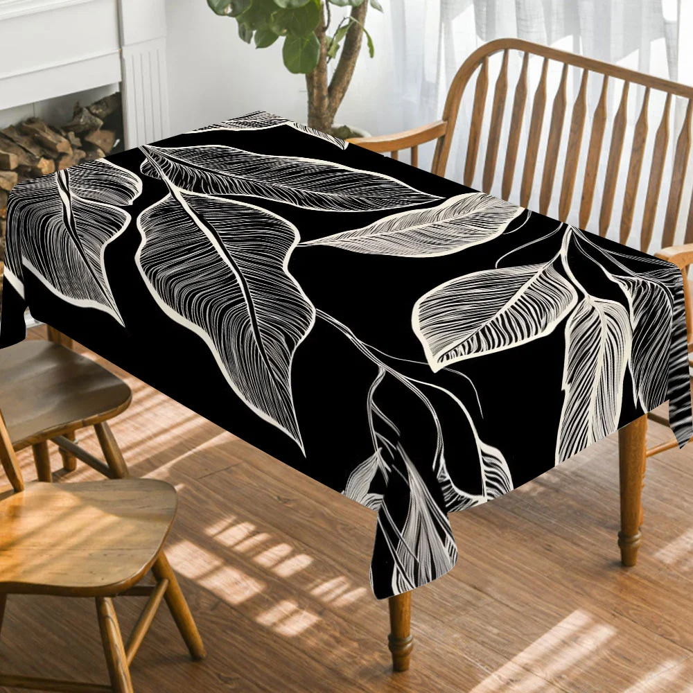 Durable polyester tablecloth with a black and white vein pattern design, suitable for modern home decoration.