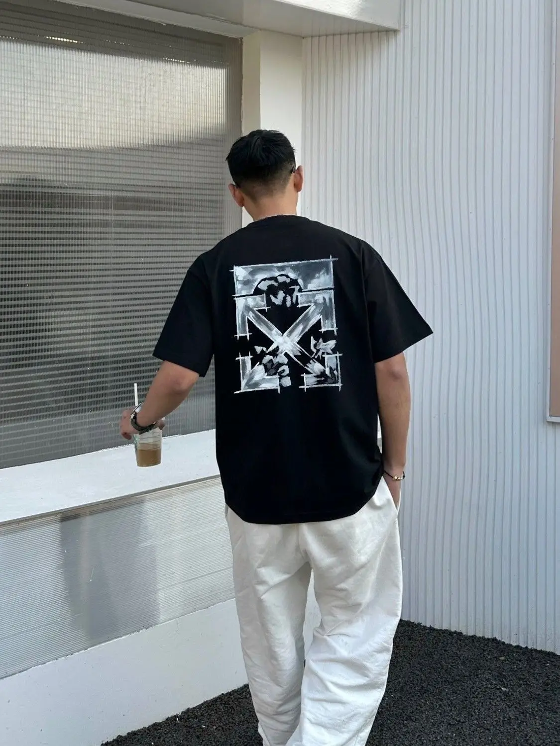 2025 Marchio di tendenza europeo e americano di T-shirt ampia e versatile per uomo e donna a maniche corte con stampa classica