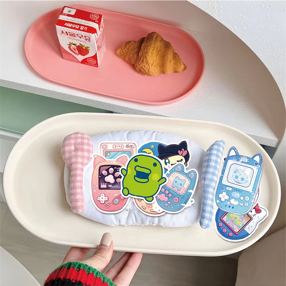 10/30/50 قطعة Kawaii Tamagotchi الحيوان الكتابة على الجدران ملصقات لطيف الكرتون شخصية ملصق محمول الأمتعة الهاتف الشارات لعبة الديكور