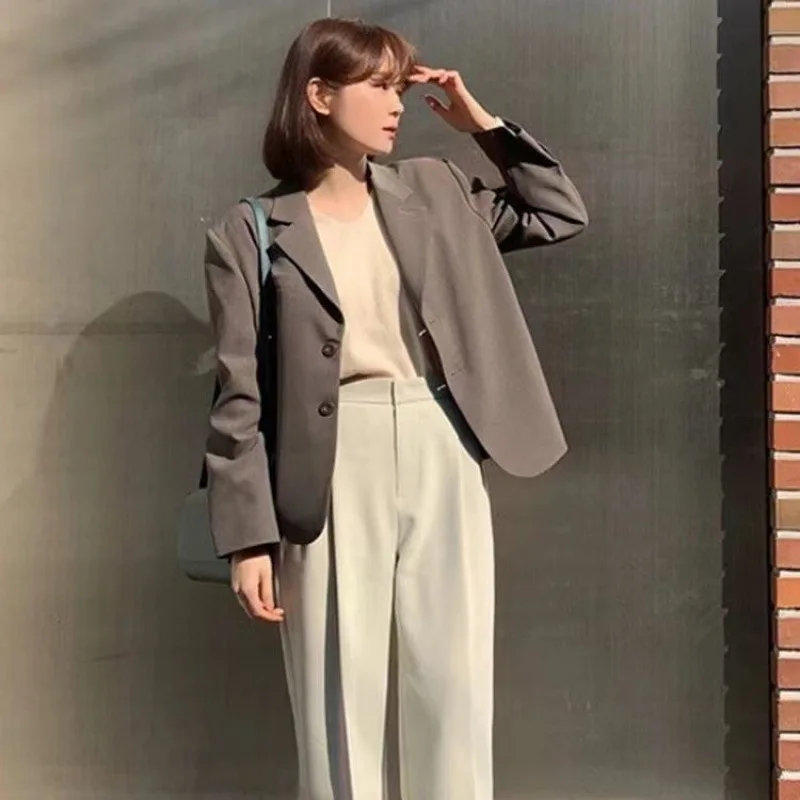 

Spring Fashion New Women's Elegant Design Sense Suit Jacket Lapel Casual Loose Fit Professional Office Commute Women Top