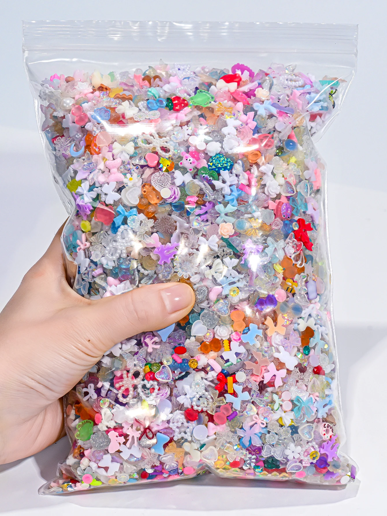 50 gr/beutel 500-600 stücke Bogen Blume Perle Nail art Strass Gemischt Luxus Schmuck Nagel Charms Harz Bogen Dekoration maniküre Liefert – Detail 1