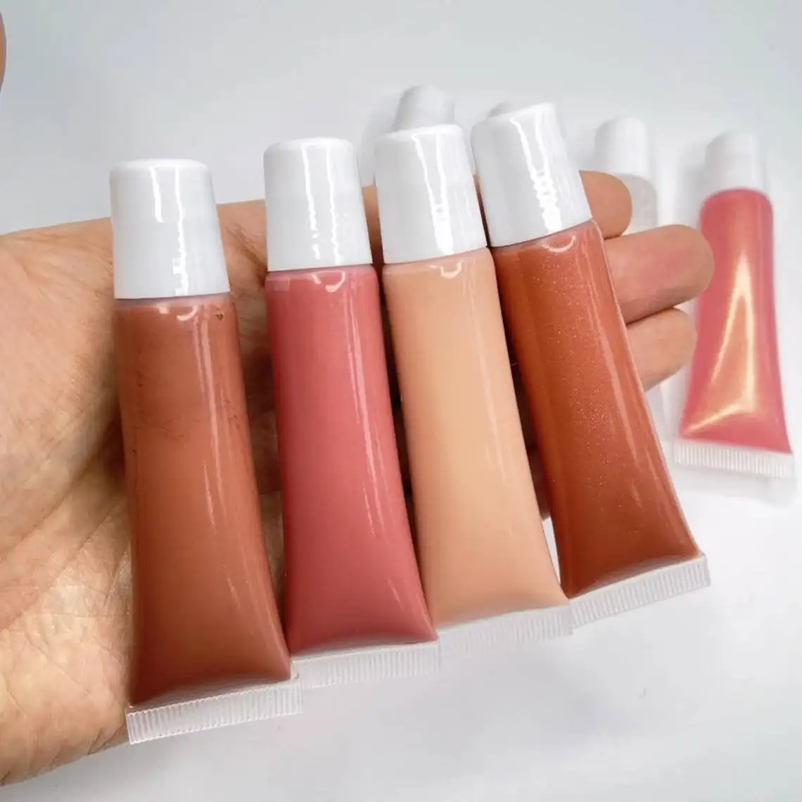 Pre-Made Lip Gloss Nude Colors Pigmented Wholesale Private Label Printed Logo on Package 15ml Squeeze Tube Vegan Cruelty Free