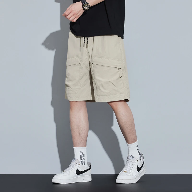 

Рабочие шорты Повседневные спортивные шорты Свободные брюки с пятью точками