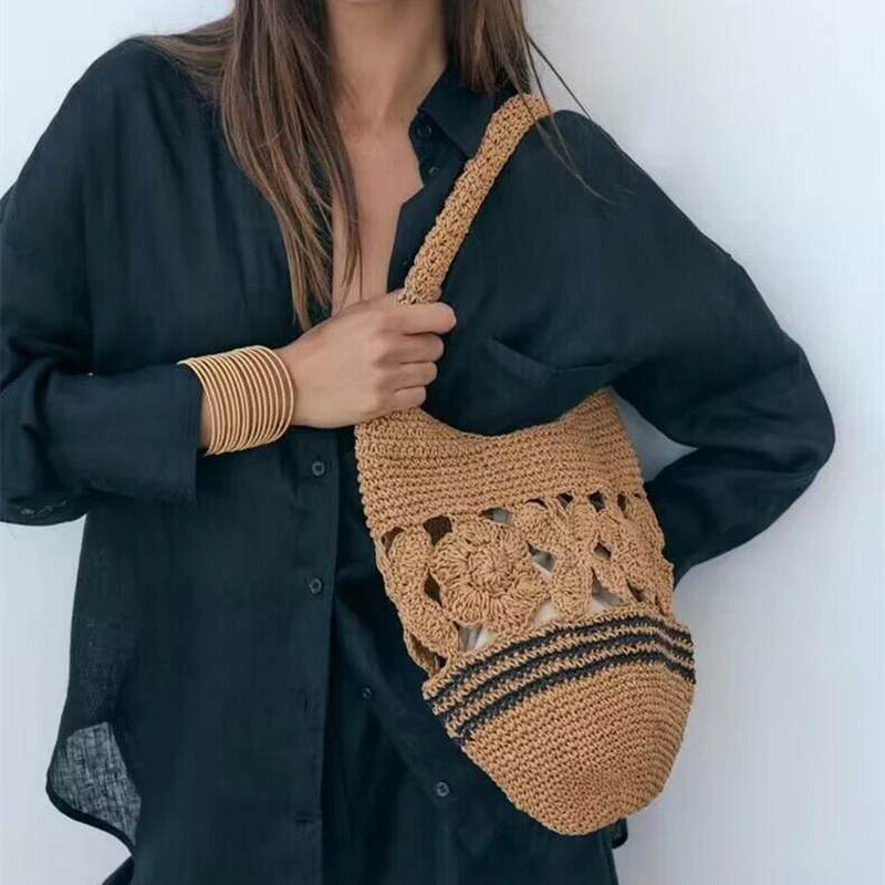 

2025 French Fashion New Lafite Grass Woven Hollow Women Bag Beach Vacation Large Capacity Bucket Type Single Shoulder Bag Trendy