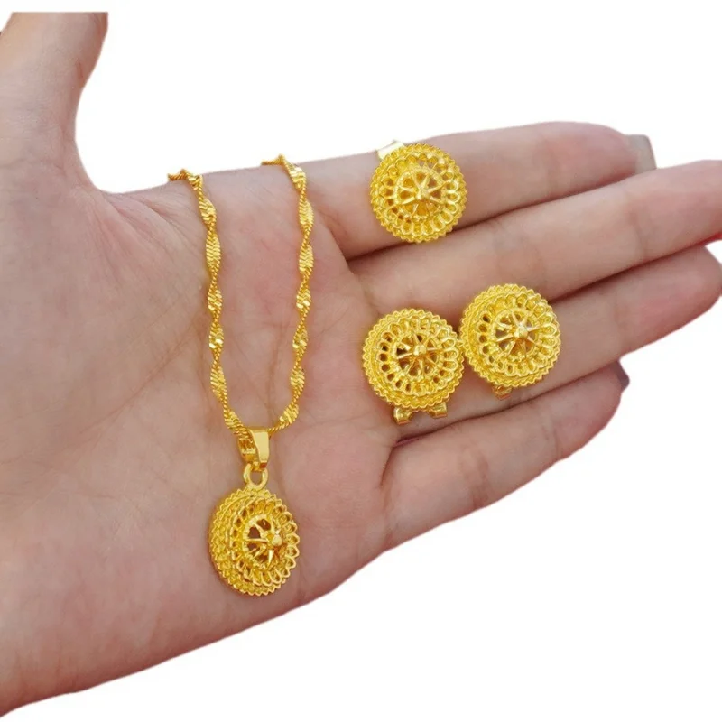 

Wholesale Cross-Border Middle East Hollow Design Gold-Plated Necklace Pendant Earrings Ring Three-Piece Jewelry Set