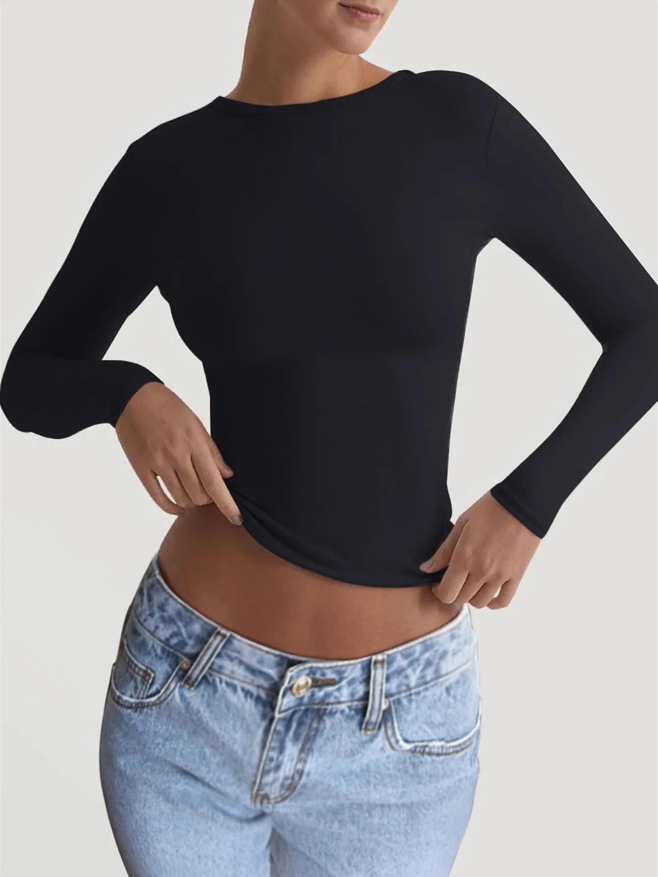 

Top Women 2026 Spring New Solid Color Y2K Knitted Backless Solid Color Round Neck Long Sleeved Slim Fit Daily Basic T-Shirt Top